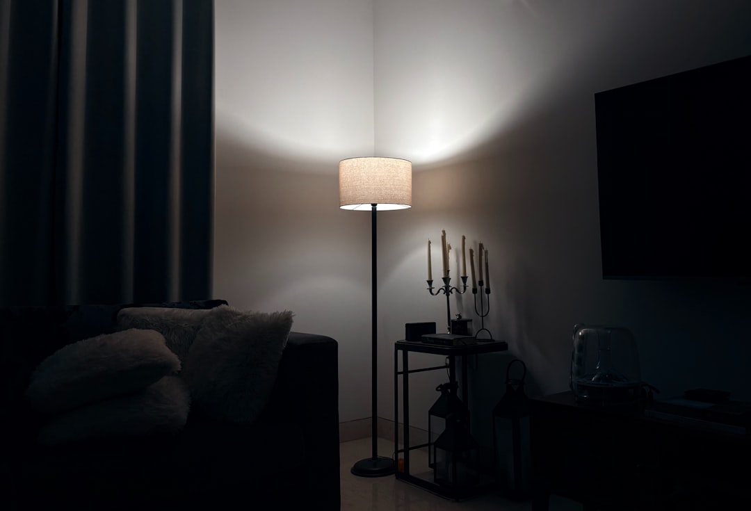 Photo Minimalist black metal wall lamp