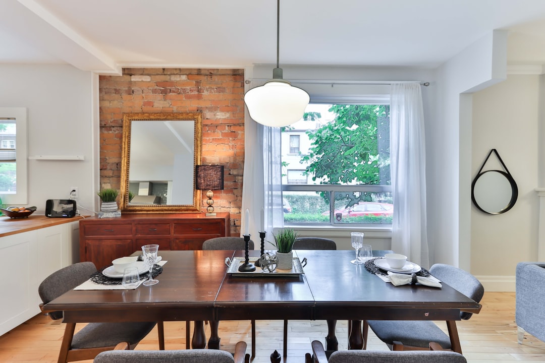 Photo transitional dining lighting